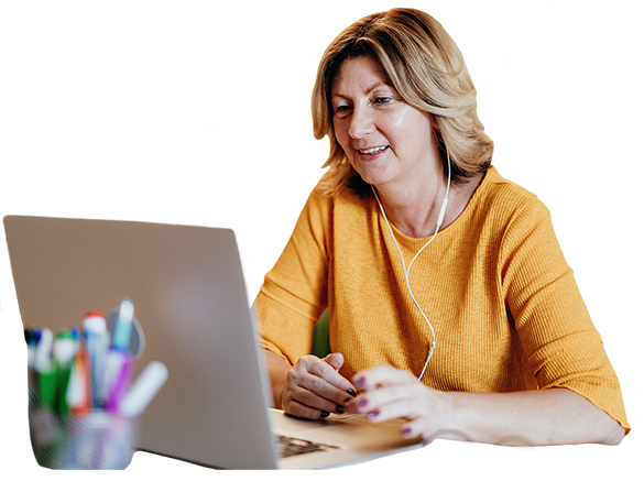 woman watching a webinar on a laptop computer